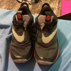 Nike adapts with charging pad and original box